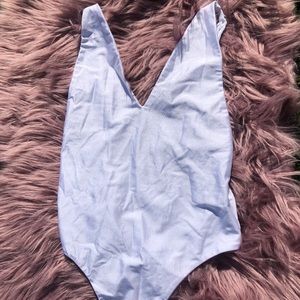 white shiny body suit ☁️